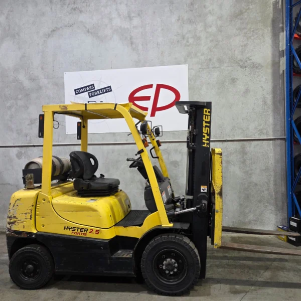 used Hyster H2.5TX-EL forklift side view in working order