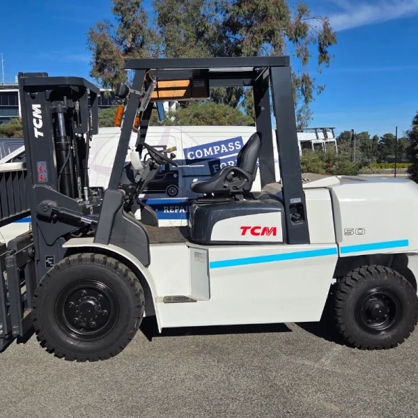 Used TCM FD50T9 5 tonne diesel forklift side profile in Perth